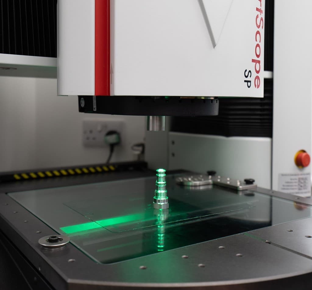 Precision metrology inspection of a CNC-machined component on an OGP SmartScope SP